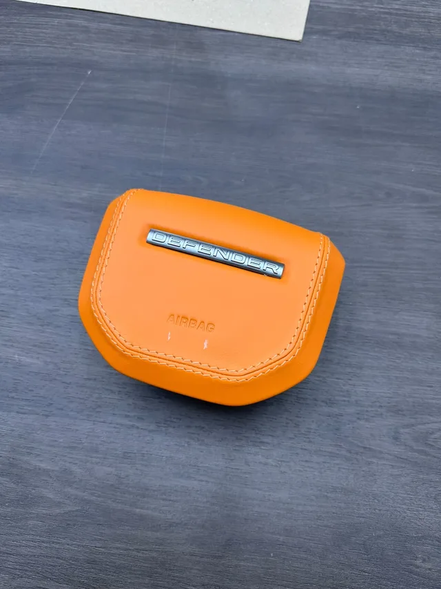 Bolsa de airbag revestida em couro com costura plana